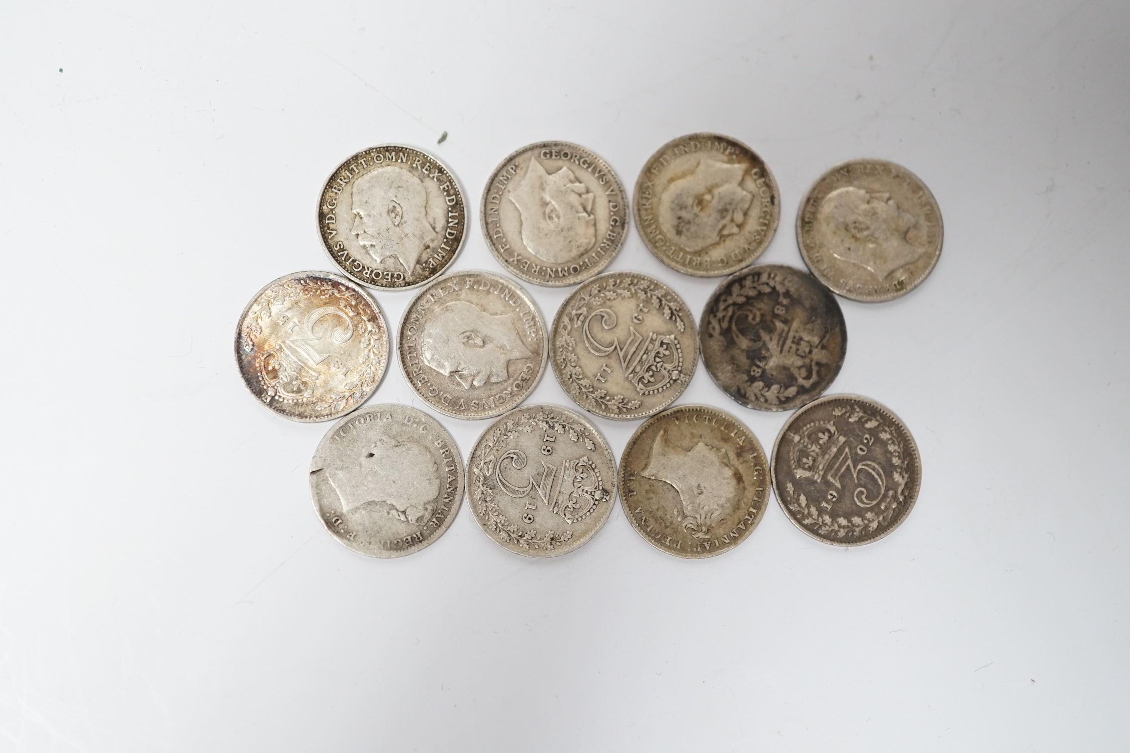 Fifty-two late 19th and early 20th century 3d coins